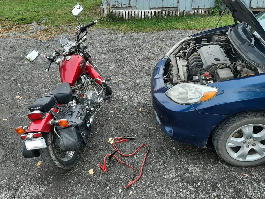 Jump start motorcycle with car