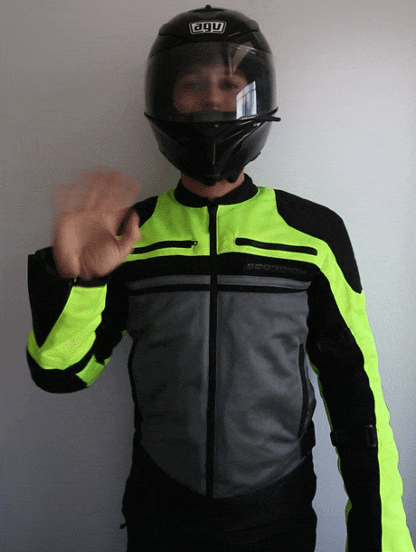 why do motorcyclists wear bright clothing